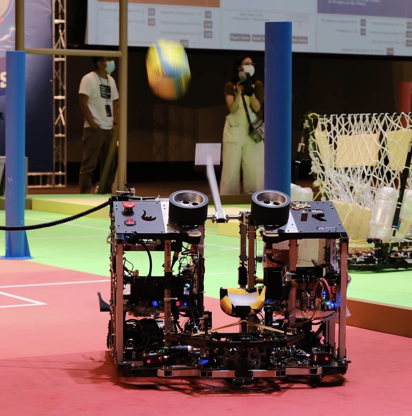 War Dragon robot launching a ball on the Robocon game field